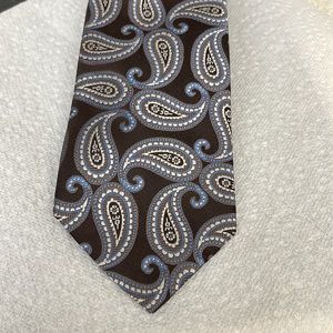 NWOT MICHAEL KORS BROWN SILK TIE. Chocolate brown w/blue & silver paisley print